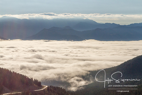 Looking down on Jackson, WY (under the clouds) from Teton Pass